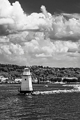 Burlington Breakwater North Light Under Cumulus Clouds - BW